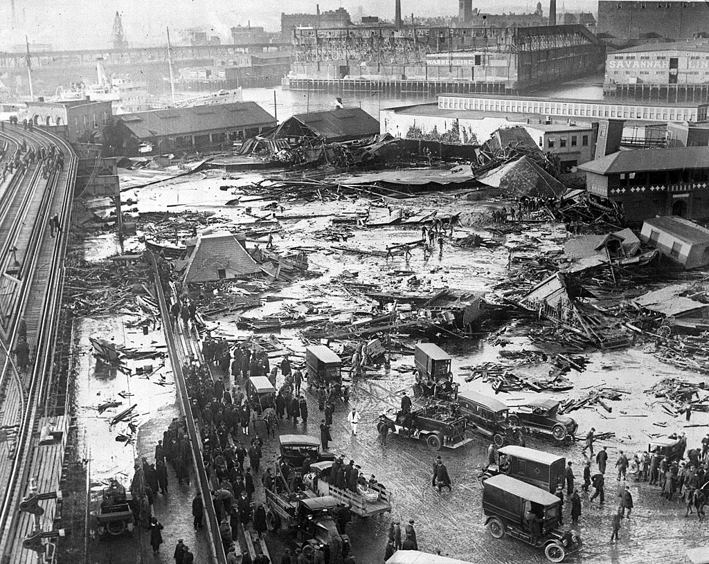 On January 15, 1919, a molasses tank at 529 Commercial Street (Boston) exploded under pressure, killing 21 people. A 40-foot wave of molasses buckled the elevated railroad tracks, crushed buildings and inundated the neighborhood. Structural defects in the tank combined with unseasonably warm temperatures contributed to the disaster. 
